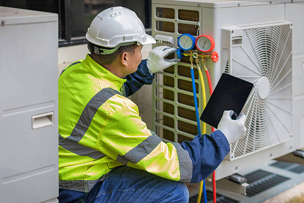 Professional Heat Pump Repair technician working in Altamont, IL